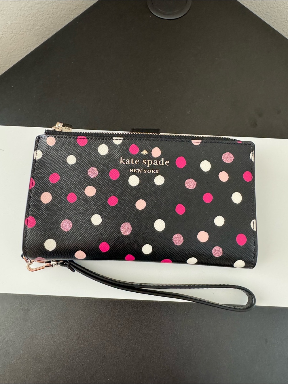 kate spade black wristlet with pink and white polka dots